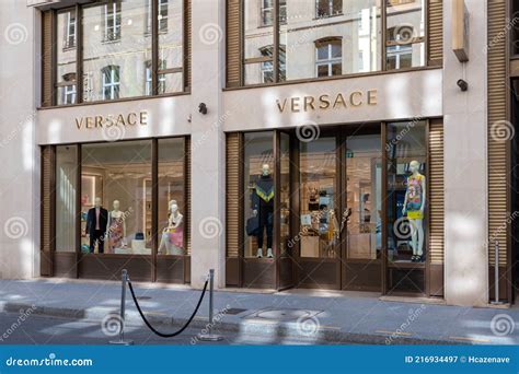 who buys versace|versace france.